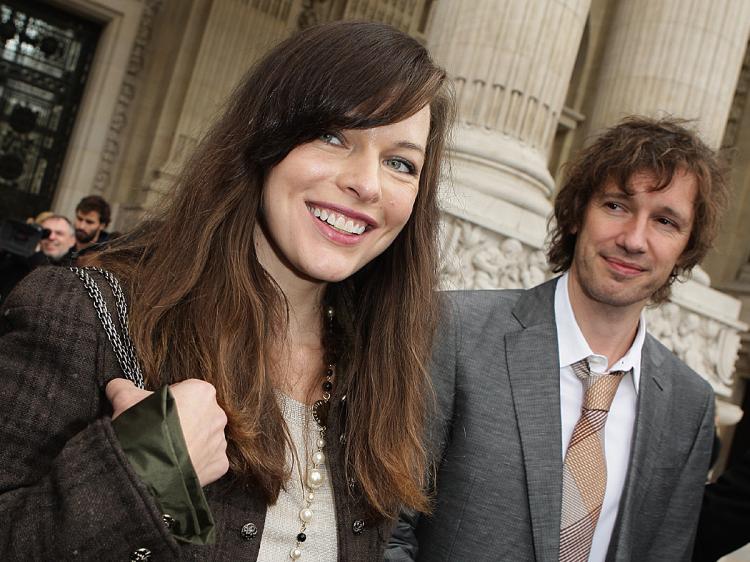 HAPPY COUPLE: Actress Milla Jovovich and movie director Paul Anderson. (Francois Durand/Getty Images)