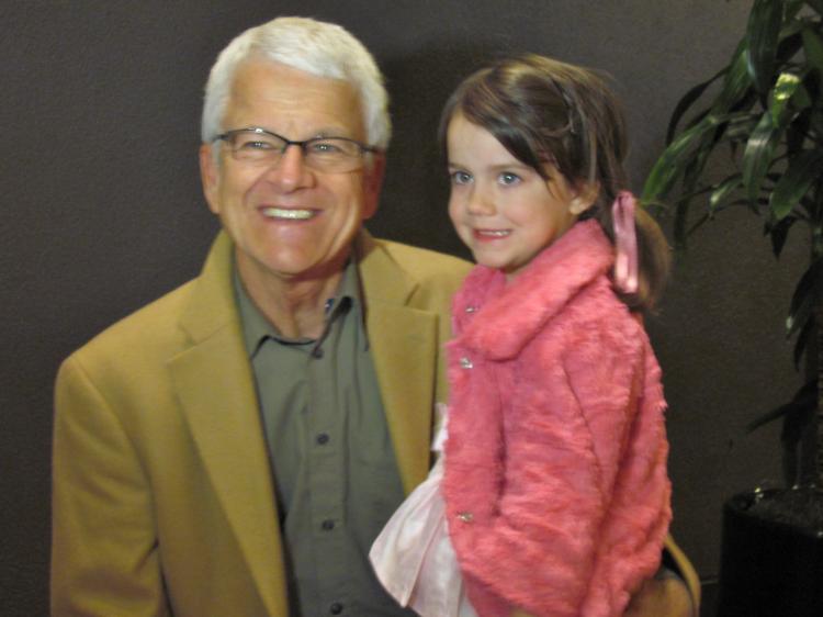 Val Dinkel, a retired owner of a cabinet shop, took his 5-year-old daughter to Shen Yun Performing Arts in Sacramento. (Courtesy of SOH Radio Network)