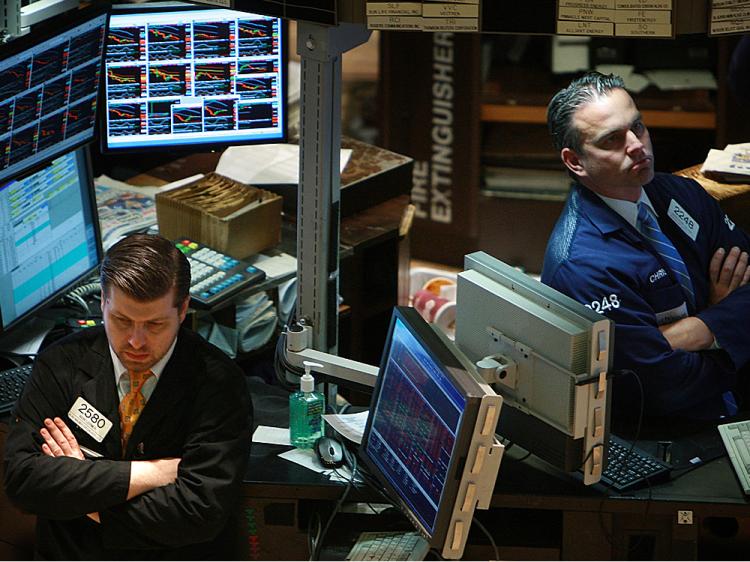 Traders work on the floor of the New York Stock Exchange (NYSE) October 06, 2008 in New York City. (Spencer Platt/Getty Images)