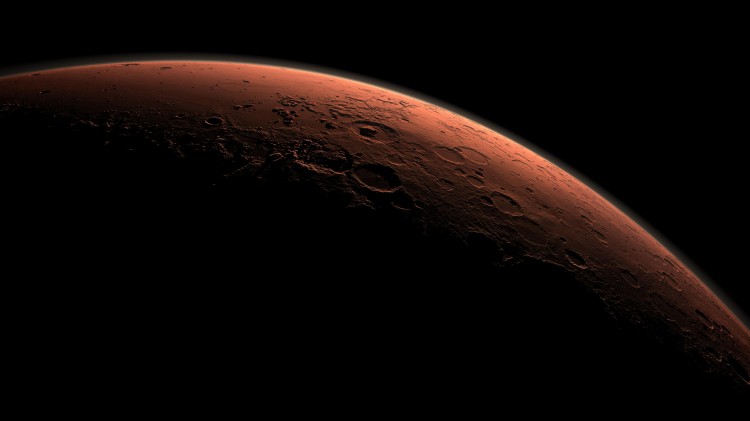 A computer-generated view depicting part of Mars at the boundary between darkness and daylight, with an area including Gale Crater. (NASA/JPL-Caltech)