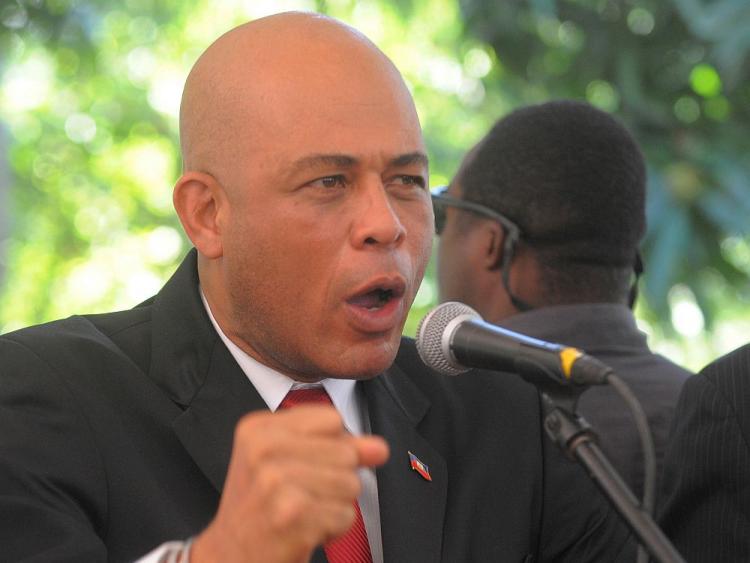 ELECTIONS: Haitian presidential candidate Michel Martelly speaks during a press conference on February 3, 2011 in Port-au-Prince. (Thony Belizaire/AFP/Getty Images) ELECTIONS: Haitian presidential candidate Michel Martelly speaks during a press conference on February 3, 2011 in Port-au-Prince. (Thony Belizaire/AFP/Getty Images)