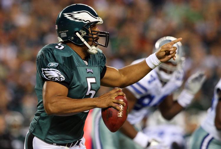 SURVIVOR: Philadelphia QB Donovan McNabb leads his team to an easy victory. (Jim McIsaac/Getty Images)