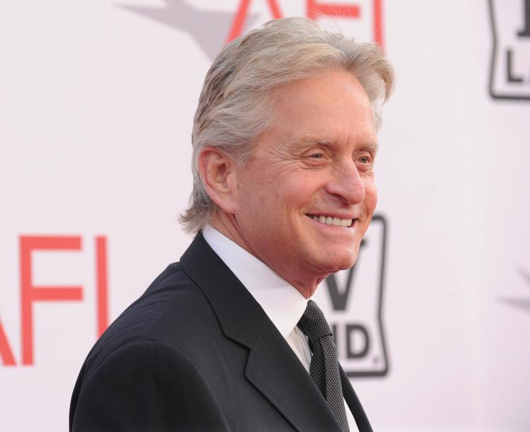 Michael Douglas said he has remained upbeat during his battle with cancer, watching lots of sports in the process. (Alberto E. Rodriguez/Getty Images)