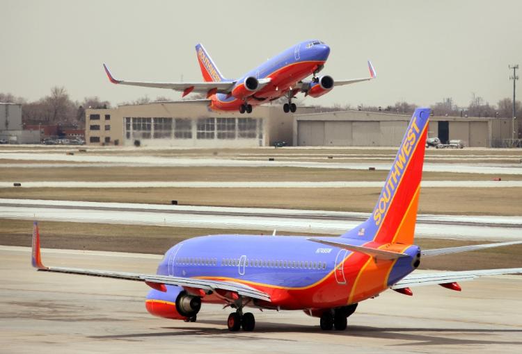 PRIVATIZATION: A jet takes off at Midway Airport on April 3, 2008 in Chicago, Illinois. Midway may become the first major airport to be privatized. (Scott Olson/Getty Images)