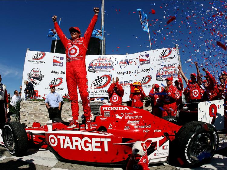 Scott Dixon celebrates winning the IRL IndyCar Series ABC Supply/A.J.Foyt 225 at the Milwaukee Mile. (Darrell Ingham/Getty Images)