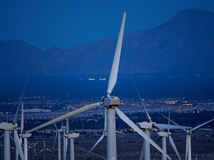 Giant wind turbines are powered by strong prevailing winds near Palm Springs, California. Sources of green power also include solar, geothermal, biomass and low-impact hydro-power. (David McNew/Getty Images)