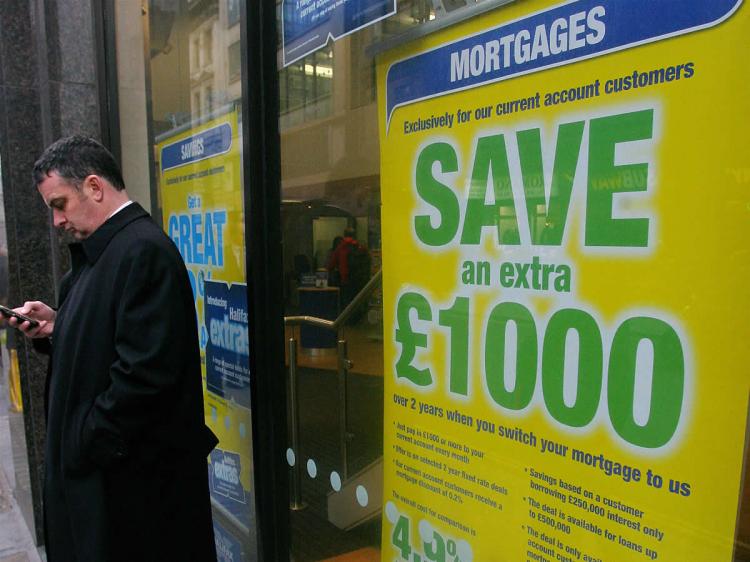 A window display advertising mortgages is pictured at a Halifax bank branch in central London, on January 19, 2009. (Carl de Souza/AFP/Getty Images)
