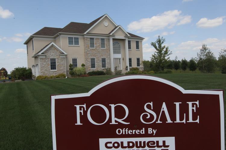 Despite low mortgage rates and home prices, housing demand is down. (Scott Olson/Getty Images)