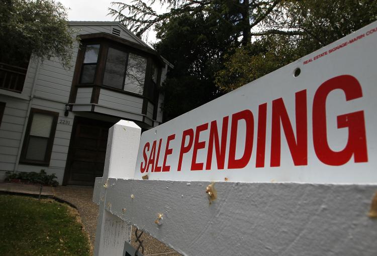 Mortgage loans with record-low rates have led to an increase in pending home sales for the second straight month. (Justin Sullivan/Getty Images)