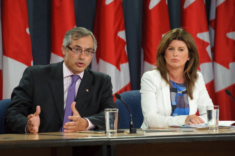 Treasury Board President Tony Clement and Public Works Minister Rona Ambrose told reporters at the National Press Gallery on Thursday that a new government agency, Shared Services Canada will better secure the government's IT infrastructure.  (PMO Photo )
