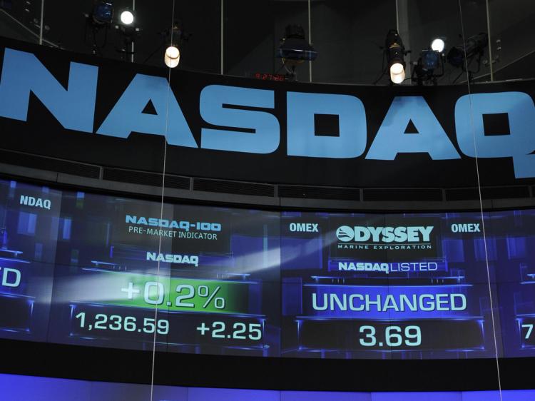 The Dow Jones industrial average was up 256 points, or 3.1 percent, while the technology-heavy NASDAQ composite index rose 63 points, or 3.5 percent. (Emmanuel Dunand/AFP/Getty Images)