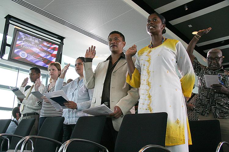 (L-R): Toffik Reyes Garcia, from Honduras, Marie-Chantel Quintero of Canada, Milagro Umanzor of El Salvador, Fidinarivo Andriambalohery of Madagascar, Carmen Helasse(C) from Trinidad and Tobago, and Norman Washington Malcom from Jamaica take the Oath of A (Karen Bleier/AFP/Getty Images)
