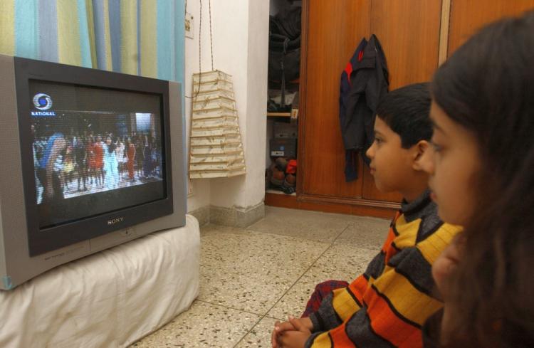 A Nielsen Ratings report from last December showed that kids between the ages of 2 and 11 log an average of 25 hours of television per week. (Manpreet Romana/AFP/Getty Images)