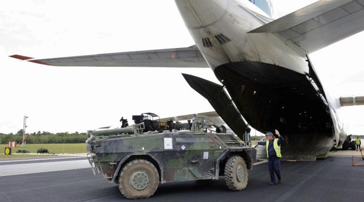 GOING BACK: Dutch military equipment arrives back from Afghanistan on Sept. 17, 2010. In early 2010 the Dutch government collapsed due to disagreements over prolonging its mission in Afghanistan. The Netherlands, which is the only NATO member state currently without forces in Afghanistan, said Friday that it plans to send police trainers to the country. (Lex Van Lieshout/AFP/Getty Images )