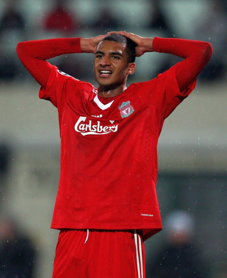 David Ngog and his Liverpool mates were knocked out of the Champions League on Tuesday. (Richard Heathcote/Getty Images)