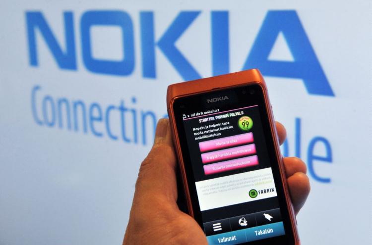 Nokia's N8 smartphone is pictured at Nokia's flagship store in Helsinki, Finland on Oct 21. Nokia announced in its most recent earnings release that it held around 30 percent of the global converged mobile phone market. (Markku Ulandaer/AFP/Getty Images )