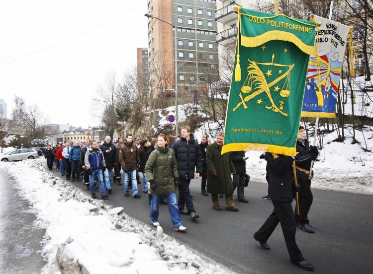 Norwegian policemen carry banners during a political strike in Oslo on Jan. 29, 2009. (Larsen Hakon Mosvold/AFP/Getty Images)