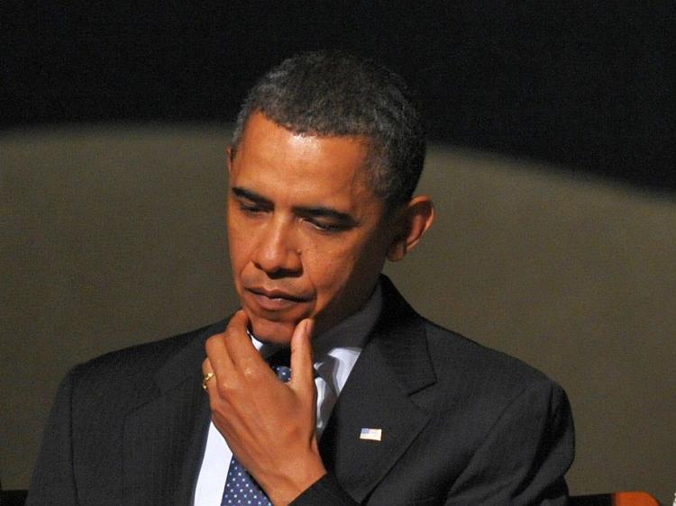 When President Obama meets with China's paramount leader, Hu Jintao, he faces the challenge of how to repair a China policy widely seen as a decades-old, bipartisan disaster. (Mandel Ngan/AFP/Getty Images)