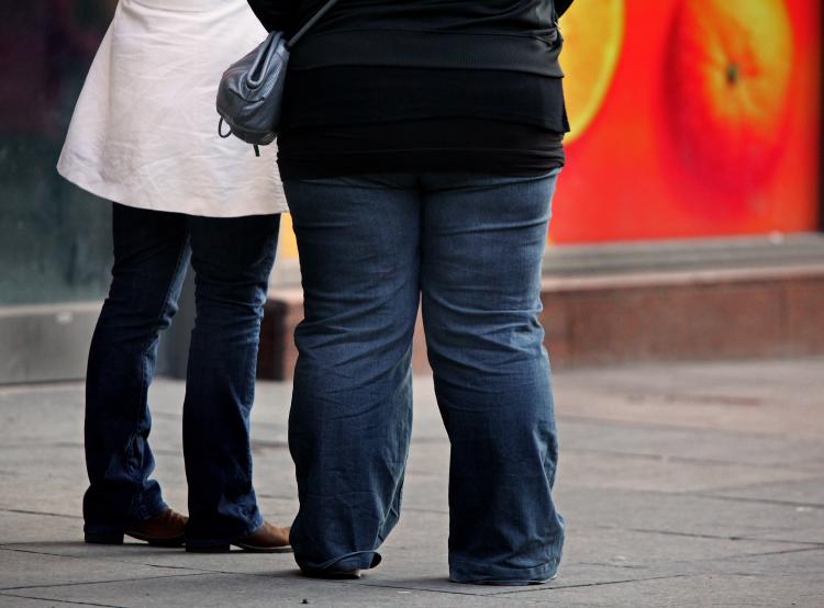 Obesity spreads easily through social networks and friendships, according to Harvard research. (Jeff J Mitchell/Getty Images)