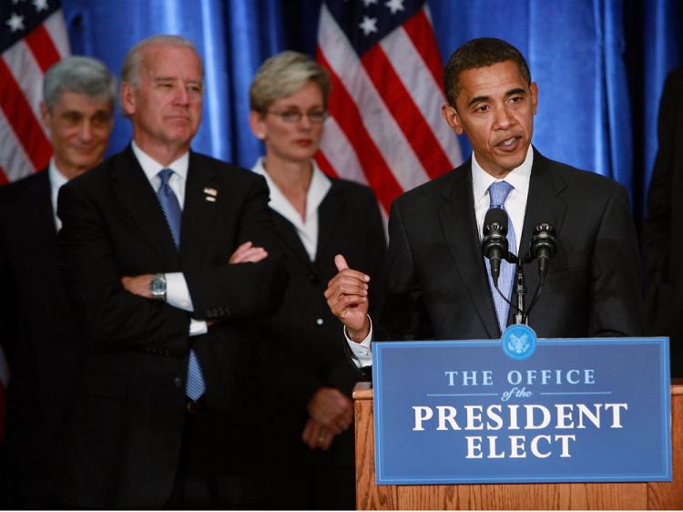 President-elect Barack Obama holds his first post-election press conference at the Hilton Hotel flanked by his vice president-elect Joe Biden (2nd L) and members of his Transition Economic Advisory Board November 7, 2008 in Chicago, Illinois.    (Scott Olson/Getty Images)