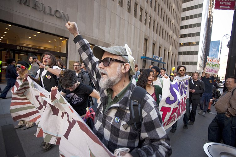 Demonstrators associated with the Occupy Wall Street movement