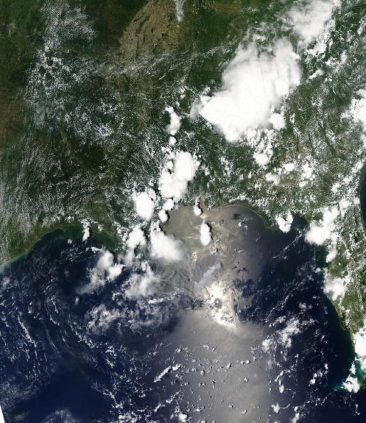 In this satellite image oil spreads northeast from the leaking Deepwater Horizon well is seen from NASA's Terra satellite, using a Moderate Resolution Imaging Spectroradiometer (MODIS) from space. (Photo by nasa via Getty Images)