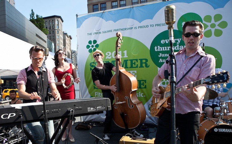 OLD SCHOOL: Million Dollar Quarter pleased the crowd on Thursday at 'Summer in the Square,' with retro hits including 'Hound Dog' by Elvis Presley. (Amal Chen/The Epoch Times)