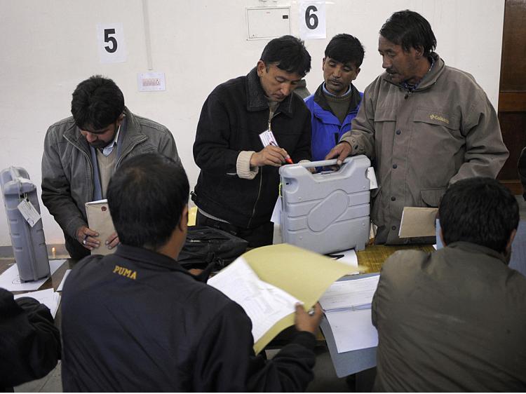 Indian polling officials seal and certify the voting machines after the end of voting at a counting centre in Leh town in Ladakh parliamentary constituency in the northern Indian state of Jammu and Kashmir on May 13, 2009. (Manpreet Romana/AFP/Getty Images)
