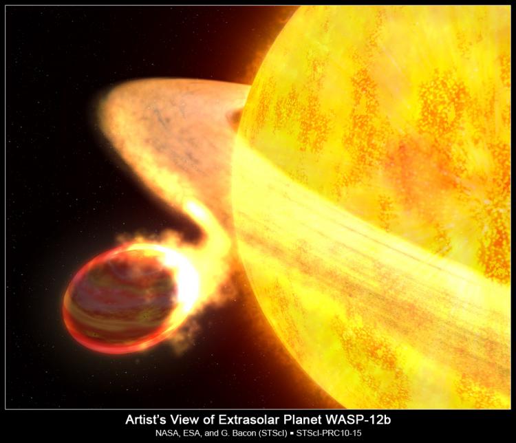 An artist's illustration of Planet WASP-12b, a Planet bigger then Jupiter, being devoured by its parent star.  (NASA, ESA, and G. Bacon/Space Telescope Science Institute)