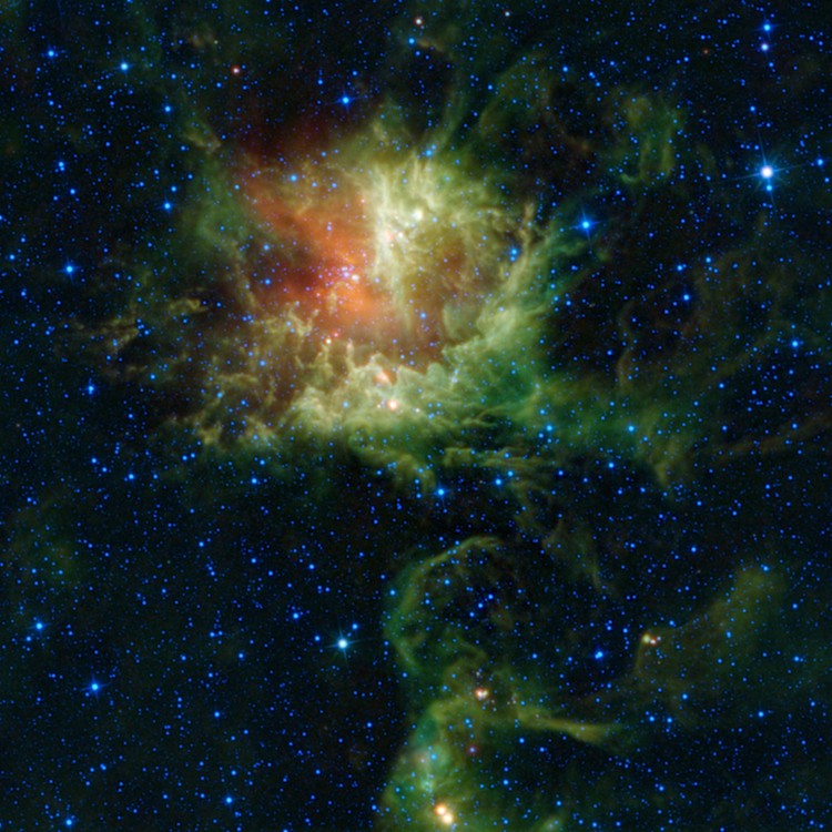 Image from all four infrared detectors aboard WISE with blue and cyan representing infrared light primarily from stars, the hottest objects pictured. Green and red represent light primarily from warm dust with the green dust being warmer than the red dust. (NASA/JPL-Caltech/UCLA)