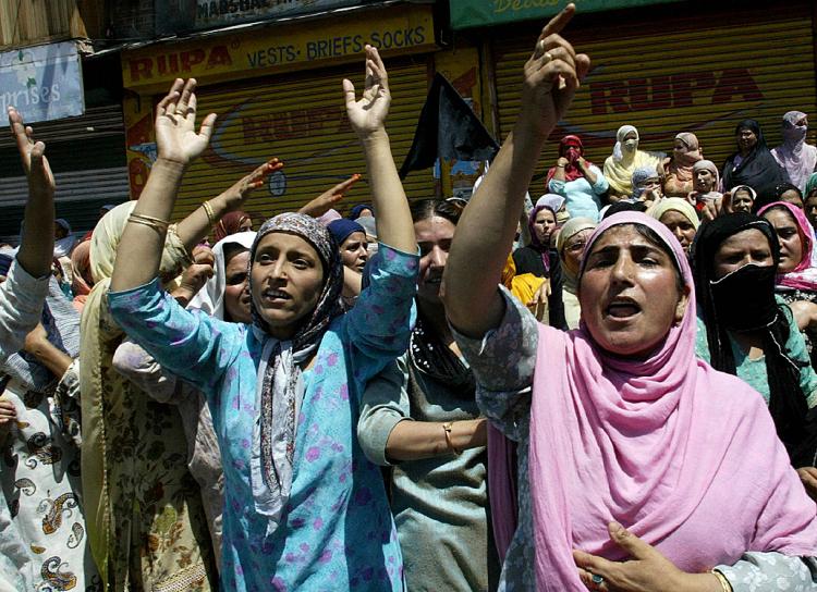 Kashmiri Muslim women shout pro-freedom slogans during a protest in Srinagar.  (Rouf Bhat/AFP/Getty Images)