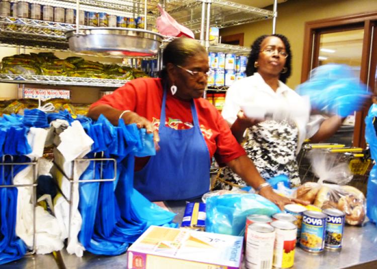 SHORTAGE: A food pantry on Manhattan's Upper West side runs low on food as recent months bring in more people in need of services. An expansion of the Federal government's food stamp program will take effect Oct. 1.  (Christine Lin/Epoch Times)