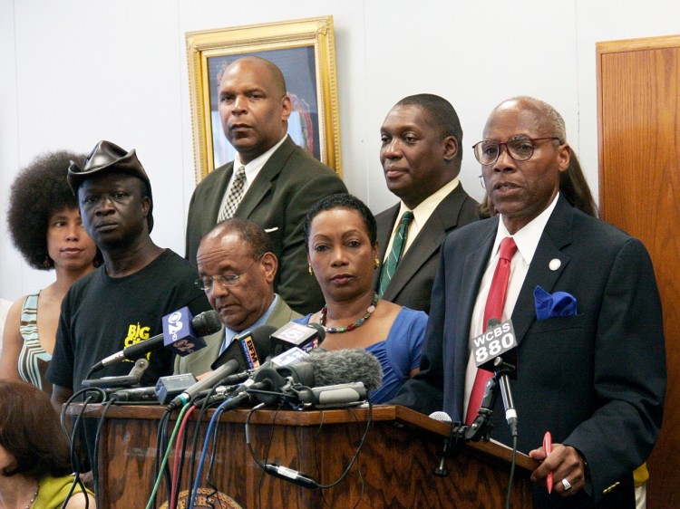 TRY THE CASE: State Sen. Bill Perkins (R) speaks at the Adam Clayton Powell Jr. State Office Building in Harlem on Sunday. Perkins was joined by several human rights organizations to urge Manhattan District Attorney to proceed with the case against former IMF head Dominique Strauss-Kahn, despite recent negative press about his accuser. (Ivan Pentchoukov/The Epoch Times)