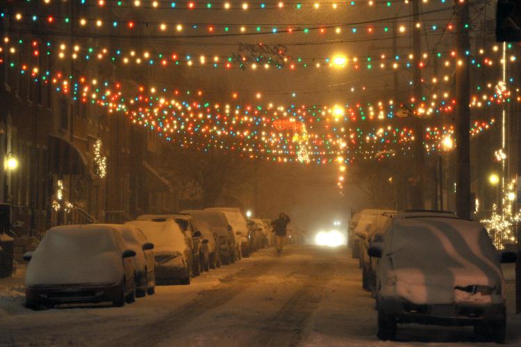 A person walks down the street during a blizzard on Sunday, Dec. 26 in Philadelphia, Pennsylvania. (Drew Hallowell/Getty Images)