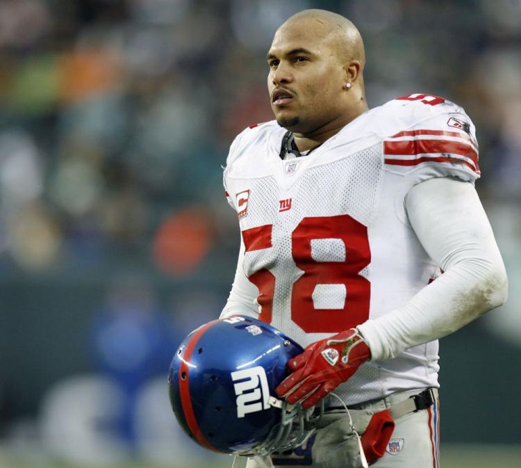 Three-time captain Antonio Pierce was released by the New York Giants on Thursday. (Jeff Zelevansky/Getty Images)
