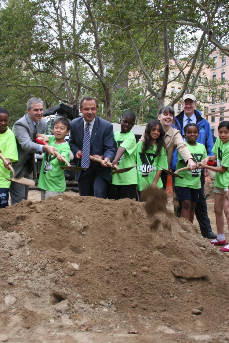 Adrian Benepe City Parks and Recreation Comissioner (center) lead the way for the ceremonial groundbreaking of the Hester Street Playground. (June Kellum/The Epoch Times)