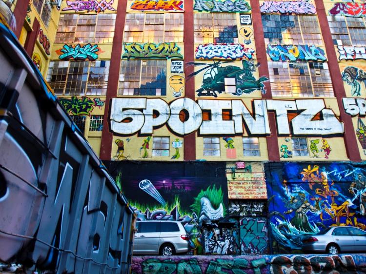 GOODBYE GRAFFITI: 5Pointz, now a site where graffiti artists are encouraged to display their talents, may soon become the home of two residential towers.  (Phoebe Zheng/The Epoch Times)