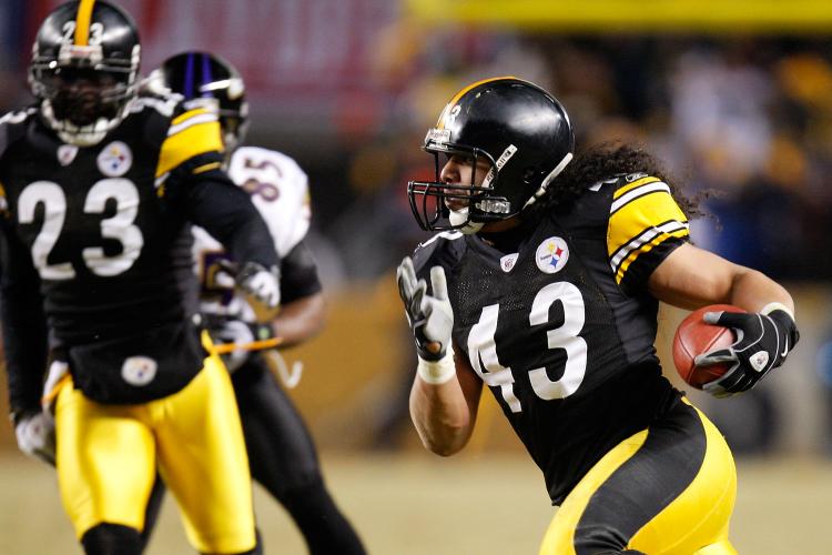 KEY PLAY: Steelers safety Troy Polamalu returns an interception 40 yards to put the game out of reach of the Ravens. ( Gregory Shamus/Getty Images)