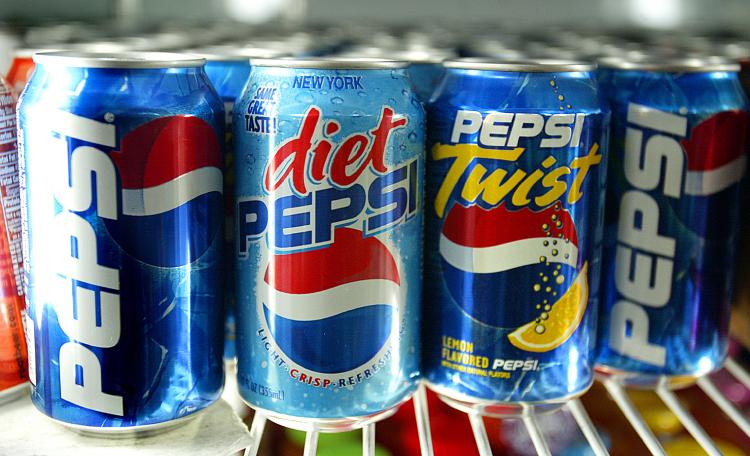 PepsiCo is buying its two biggest bottlers for $7.8 million. (Mario Tama/Getty Images)