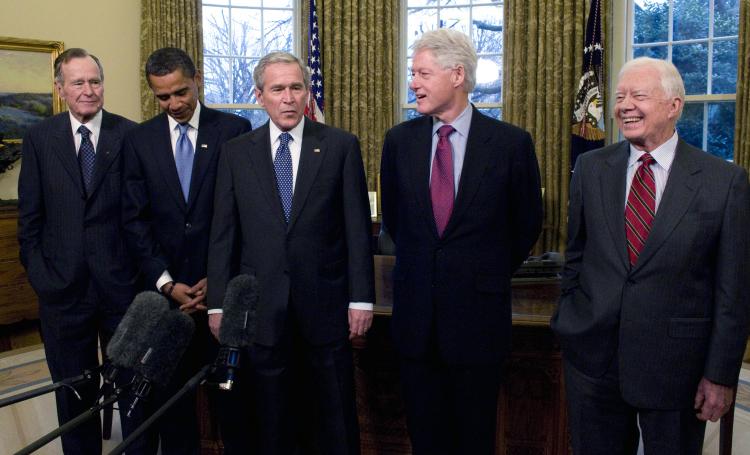 U.S. President George W. Bush (C) meets with President-elect Barack Obama (2nd-L), former President Bill Clinton (2nd-R), former President Jimmy Carter (R) and former President George H.W. Bush (L) in the Oval Office in Washington, DC.  (Ron Sachs-Pool/Getty Images)