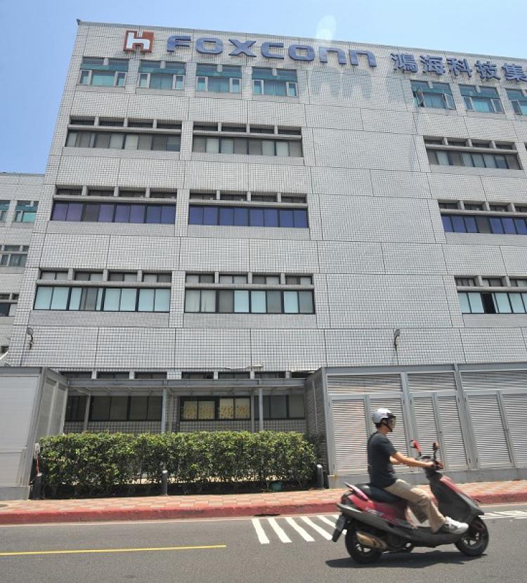 Pay raise at Foxconn in Shenzhen triggers protests for pay raises elsewhere. Photo shows Foxconn headquarter in Taiwan. (Patrick Lin/APF/Getty Images)