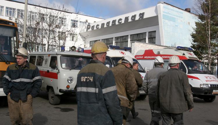 Rescuers walk near the Raspadskaya mine in the Kemerovo region of southwestern Siberia on May 9. Over 80 miners and rescuers were trapped in a Russian mine Sunday after twin methane gas blasts killed 12 and then ensnared rescue workers who had descended down the shaft to find survivors. (AFP/Getty Images)