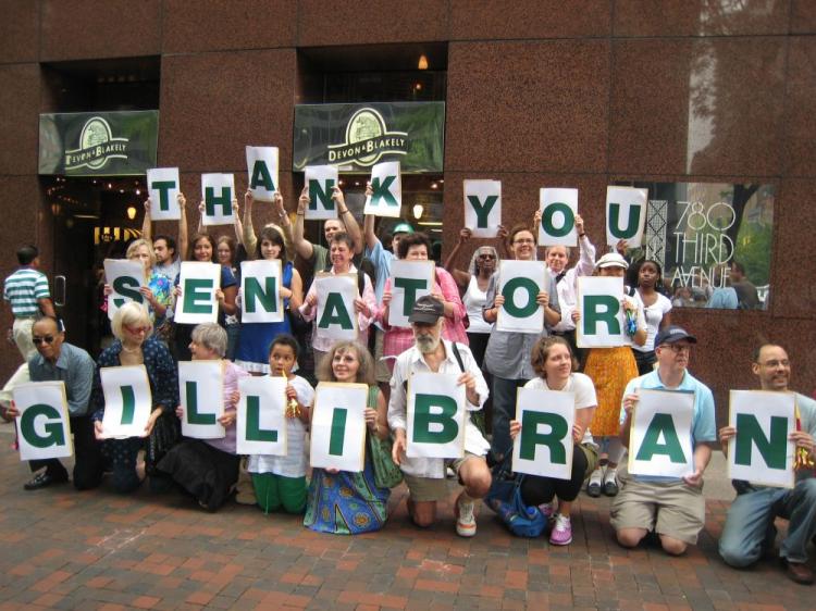 MoveOn members thanked Senator Kirsten Gillibrand for her efforts on the energy bill. (Stephanie Lam/The Epoch Times)