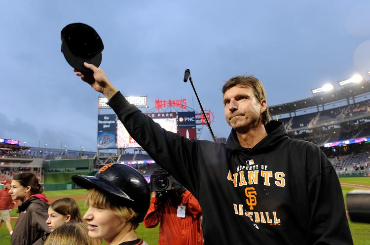 300 WINS: Randy Johnson salutes the crowd on June 4 after beating the Washington Nationals and reaching that all-important pitching milestone in one of baseball's memorable moments of the season so far. (Greg Fiume/Getty Images)