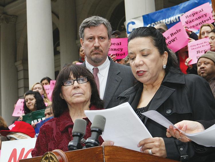 RENT CONTROL: Council Member Sara Gonzalez (R) speaks at a press conference at City Hall on Wednesday announcing new legislation that aims to protect affordable housing in the city. Also pictured are Council Members Bill De Blasio (C) and Helen Sears (L). (Christine Lin/The Epoch Times)