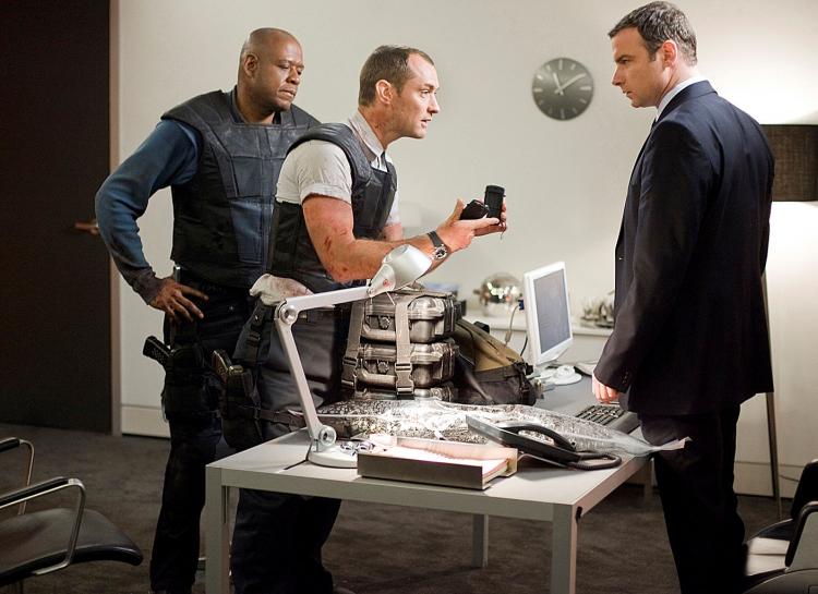 LOANSHARKS: (L-R) Forest Whitaker and Jude Law reason with The Union's manager, played by Liev Schreiber, in 'Repo Men,' a futuristic action-thriller. (Kerry Hayes/Universal Studios)