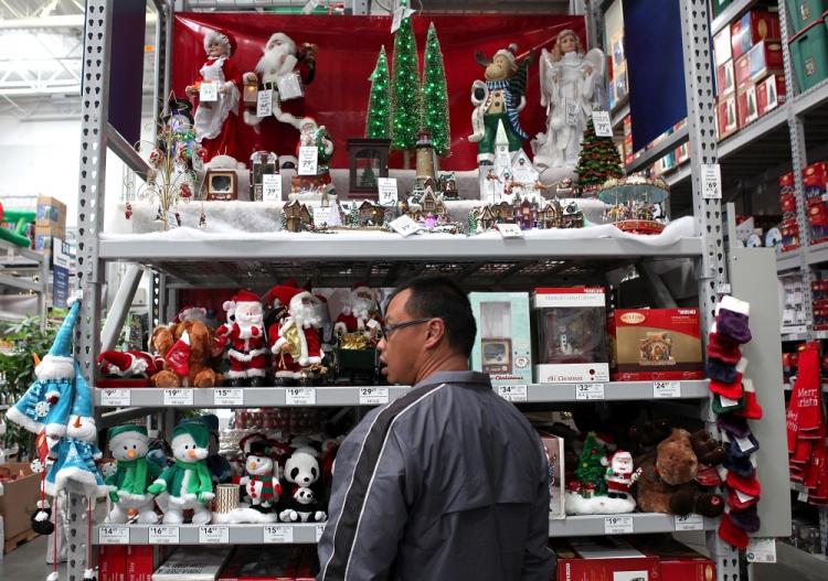 Retail sales increased 1.2 percent in October. A customer at a Lowe's home improvement store looks at a display of holiday decorations on Nov. 4, 2010 in San Francisco, California. With three weeks to go until Thanksgiving, retail stores are beginning to sell holiday merchandise.  (Justin Sullivan/Getty Images)