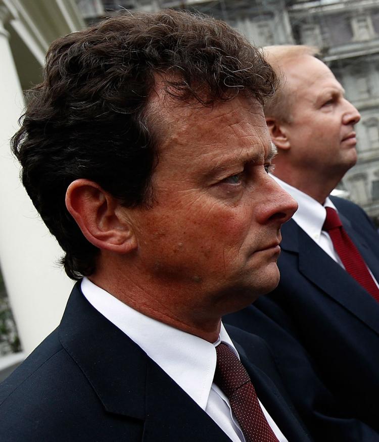 Robert Dudley, incoming BP CEO (R, backgound), with outgoing BP CEO Tony Hayward at the White House on June 16. Hayward defended BP's response to the Gulf oil spill this week. (Win McNamee/Getty Images)