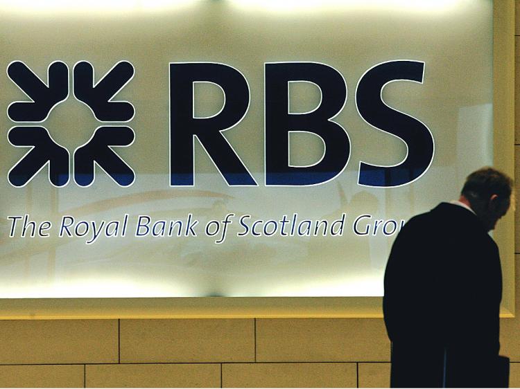 A man walks into the London headquarters of the Royal Bank of Scotland, (RBS) on January 19, 2009.    (Carl De Souza/AFP/Getty Images)