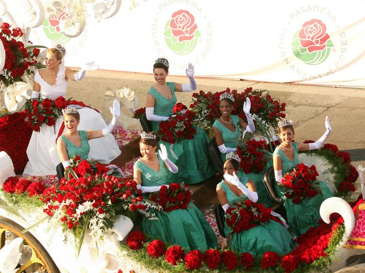 The Rose Queen & Royal Court float members wave on the parade route at the 118th Tournament of Roses Parade on January 1, 2007 in Pasadena, California.  (Frederick M. Brown/Getty Images)